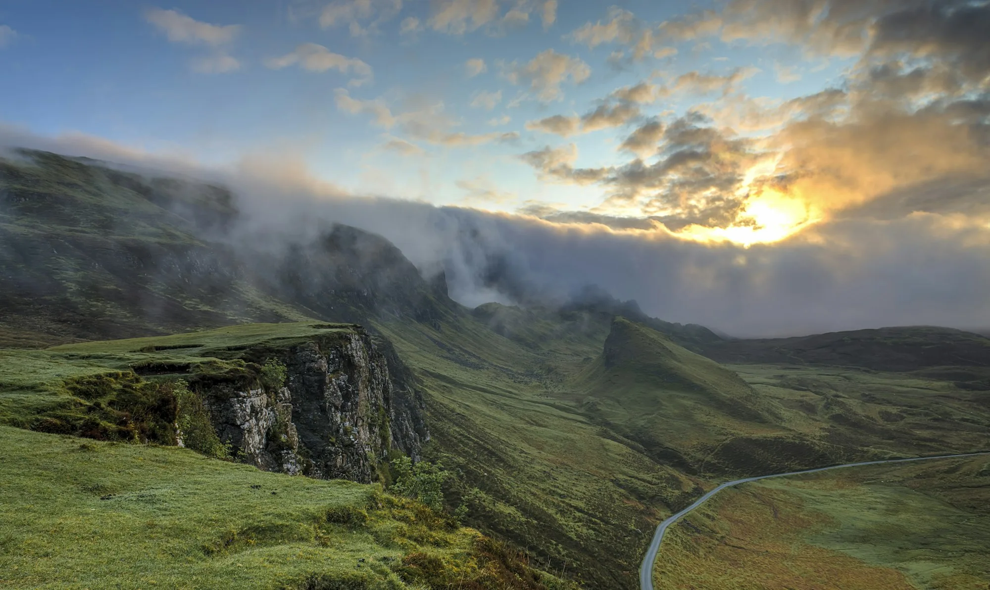 A quiet mountain path at sunrise